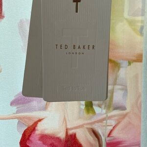 Ted Baker light sweater. Brand New with tags. No longer available in Canada!